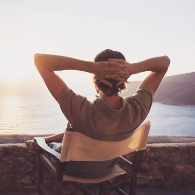 Enjoying,Life.,Back,Side,Of,Young,Man,Looking,At,The