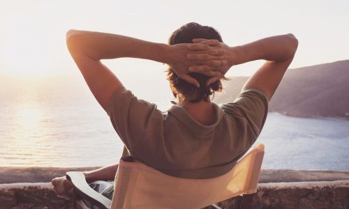 Enjoying,Life.,Back,Side,Of,Young,Man,Looking,At,The